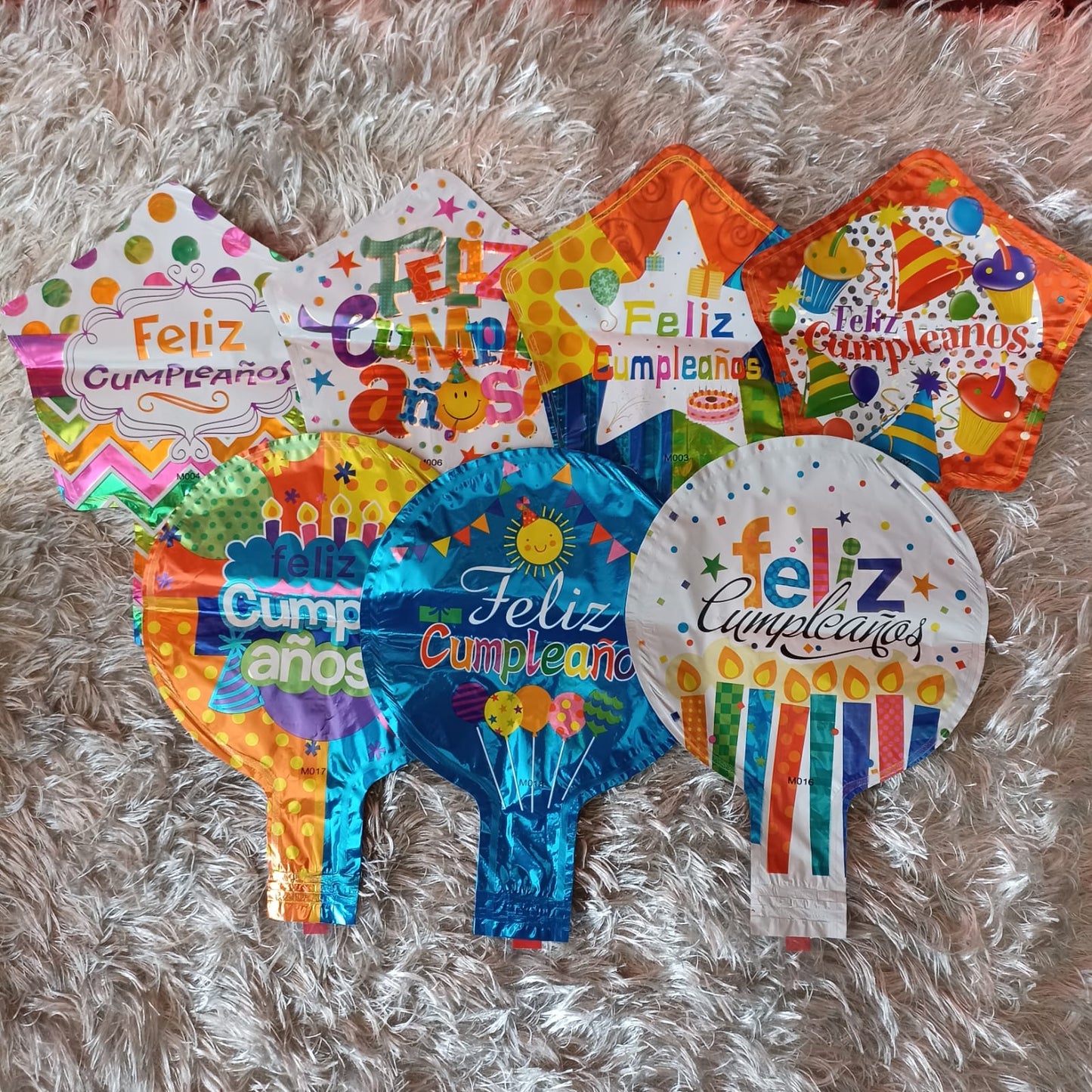 Paq. 10 miniglobos 5" feliz cumpleaños con portaglobos. GA5