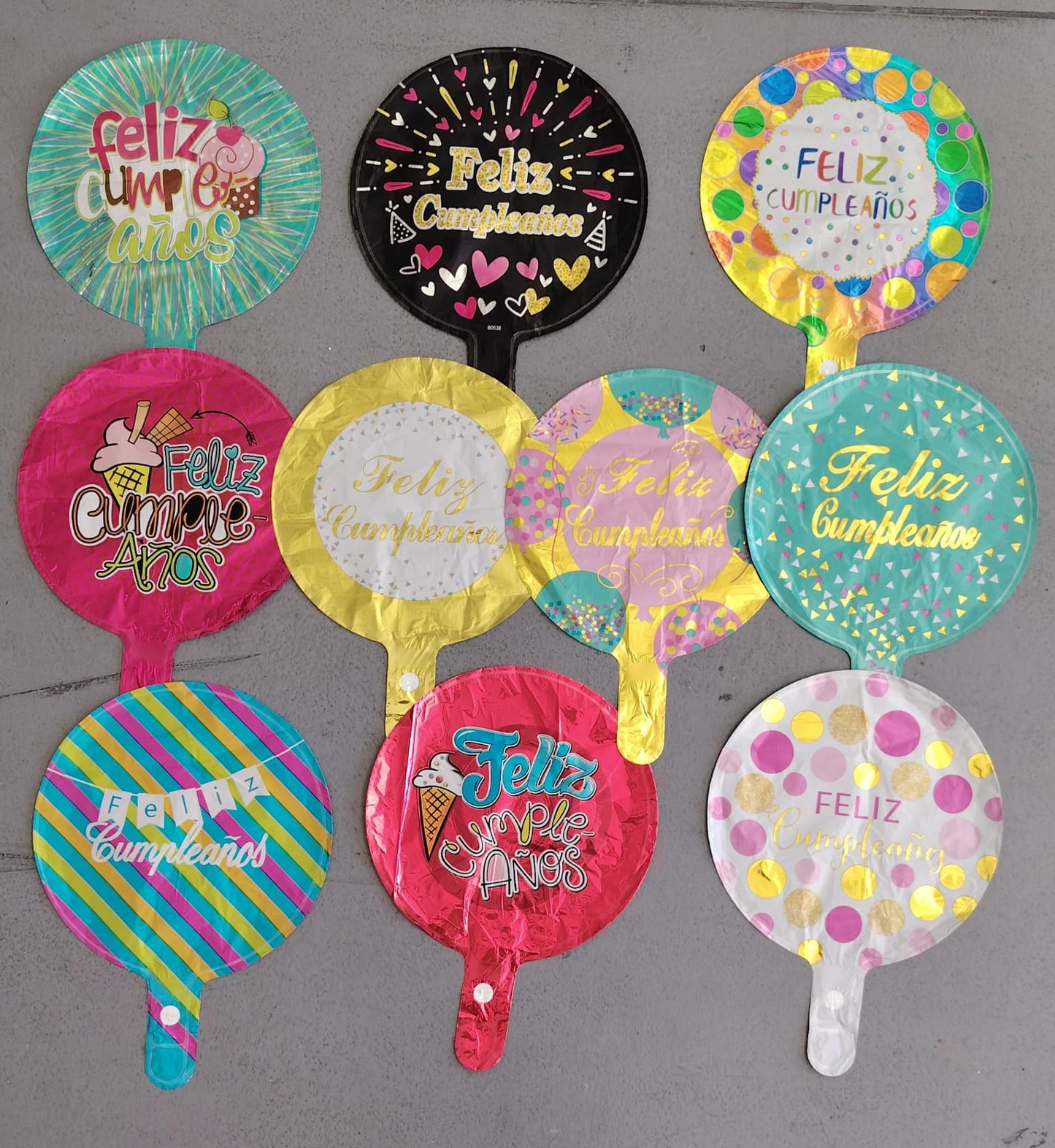 Paq. 10 globos 10" feliz cumpleaños con portaglobos. GA10