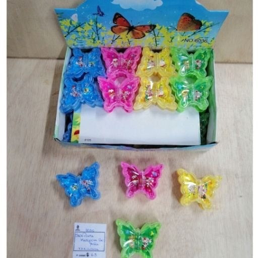 Sacapunta con forma de mariposa. 6036
