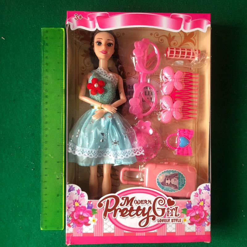 Muñeca con accesorios. JM520X50
