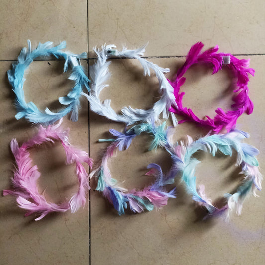 Cintillo de plumas con luz. AR23612