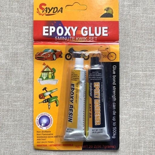 Pega epóxica. 03483