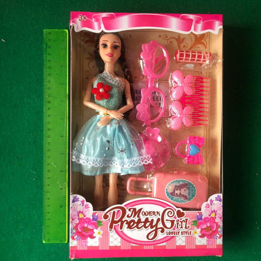 Muñeca con accesorios. JM520X50
